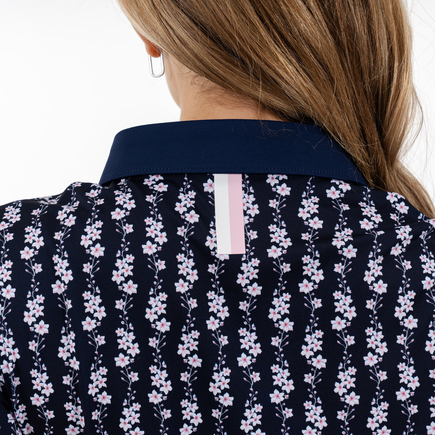 Blossom Bloom Performance Polo | The Blossom Bloom - Fleet Navy/White