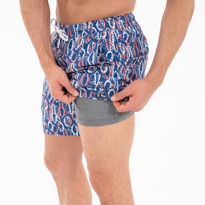 Medley Swim Trunk | The Crusher - Deep Blue/Washed Red