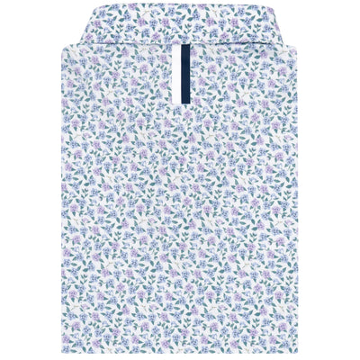 The RHOBACK The Flutter Floral Performance Polo in White/Air Blue features a zippered collar and a pattern of small purple and blue flowers with green leaves, made from moisture-wicking fabric for style and comfort.