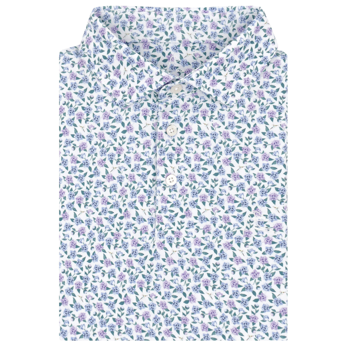 The RHOBACK Flutter Floral Performance Polo in White/Air Blue features an all-over floral print in purple, blue, and green on a white background. Its classic collar and moisture-wicking fabric keep you cool and dry all day. Two white buttons complete the look.