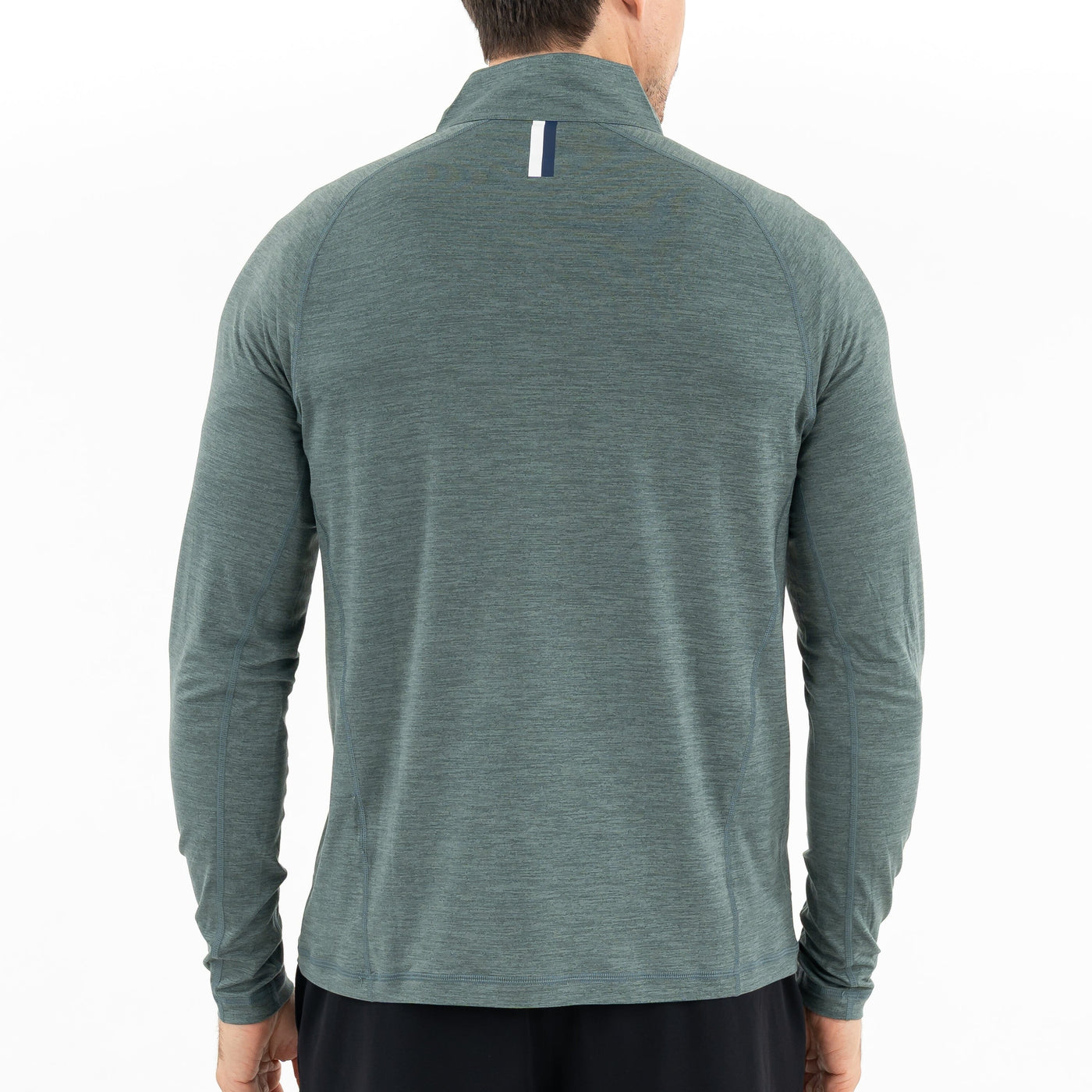 A man is shown from the back wearing the RHOBACK Tailwind Performance Q-Zip in Heather - Jungle Green/Dusty Pine, a long-sleeved, moisture-wicking SkyKnit™ jacket featuring a small vertical striped detail near the collar.