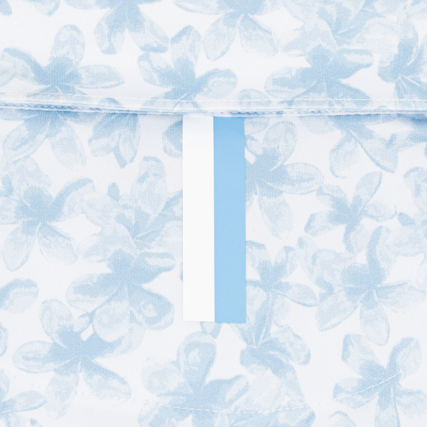 The Hula Bloom | Performance Polo | The Hula Bloom - White/Pure Blue