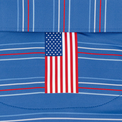 The RHOBACK Ivy Stripe Performance Polo in Short Stop Blue/White features horizontal and vertical stripes, moisture-wicking fabric, UPF protection, and a sewn American flag tag.