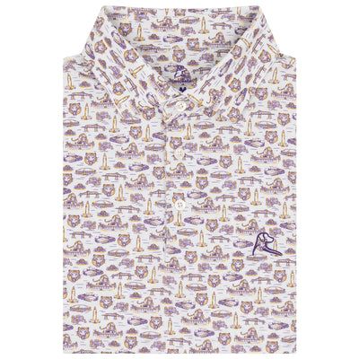 The LSU Baton Rouge Collegiate Polo by RHOBACK features a folded white design with purple and gold landmark print, crafted from moisture-wicking fabric and finished with an embroidered pelican logo on the lower right side.