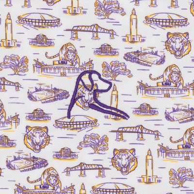 The RHOBACK LSU Baton Rouge Collegiate Polo in White/Reauxback Purple features performance fabric with purple and gold LSU landmarks, tigers, and logos, plus a bold purple "R" over a tiger head—ideal for any LSU fan's collection.
