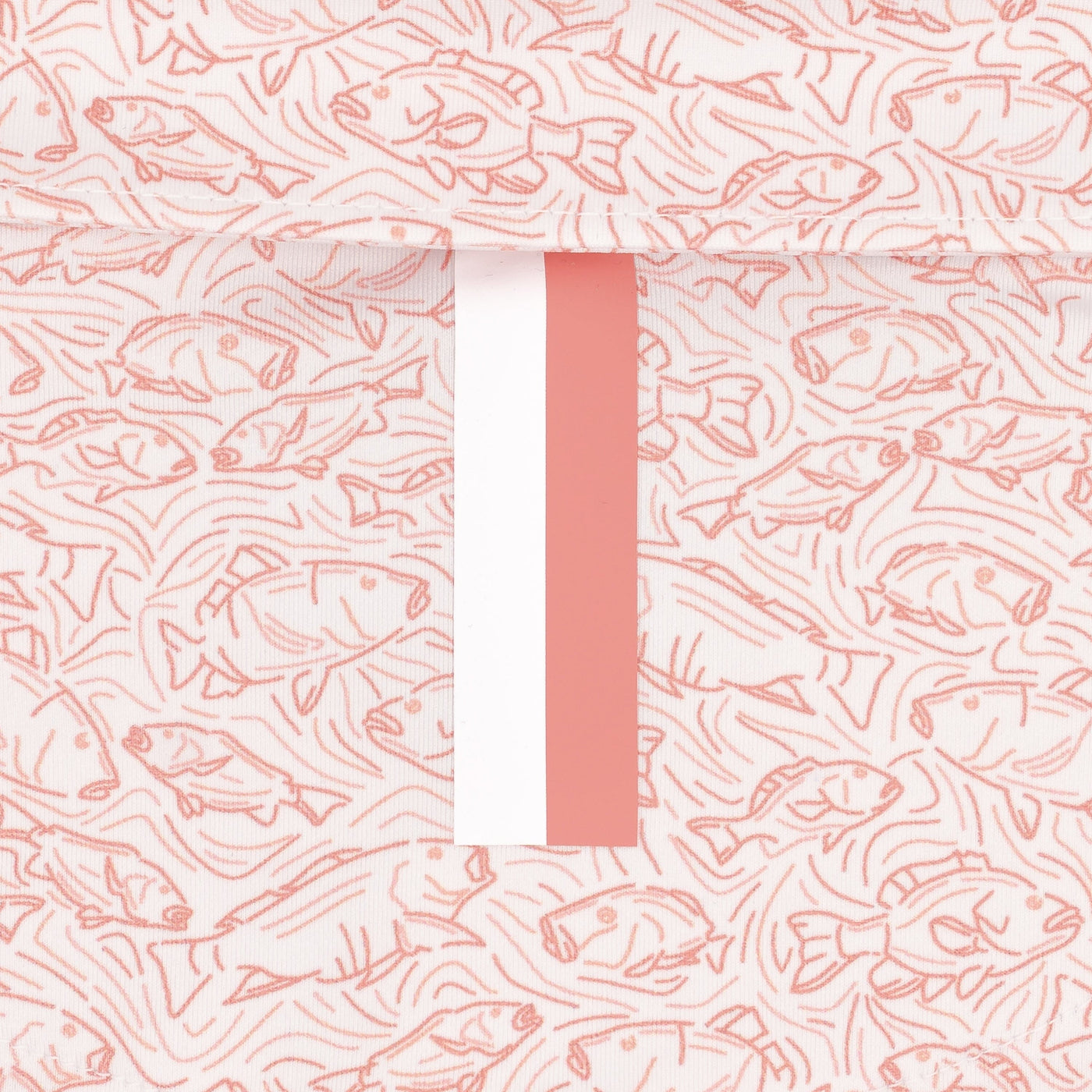 The RHOBACK Snapper Performance Polo features a breathable fabric with light pink fish line drawings on a cream background and a vertical pink and white stripe down the center.
